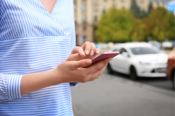 Woman Hailing a Taxi